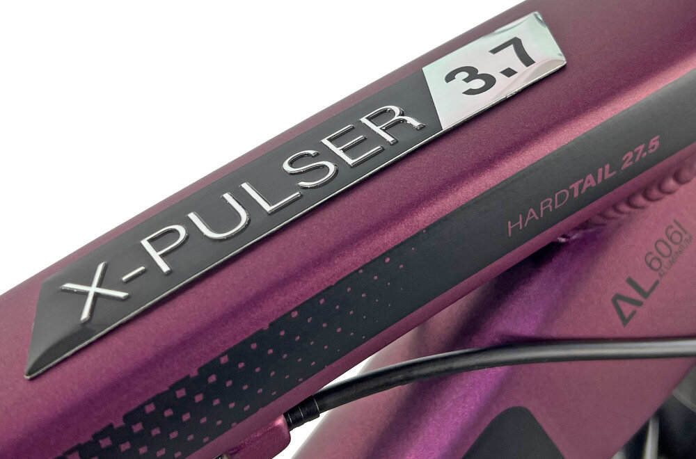 Rower górski MTB INDIANA X-Pulser 3.7 D19 27.5 cala damski Fioletowy zbliżenie na ramę 19-calowa aluminiowa ramę rower zwinny lekki łatwo go podnieść odporność na korozję wybór rozmiaru ramy Twój wzrost mierzony w zrelaksowanej pozycji typ roweru dla osób o wzroście od 174 do 180 cm
