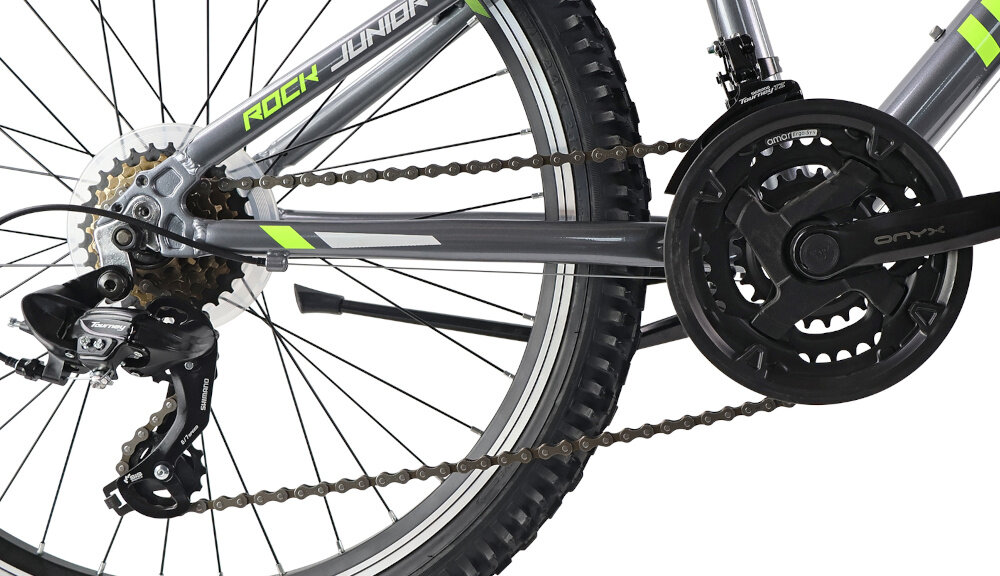 Rower młodzieżowy INDIANA Rock Jr 24 cale dla chłopca Szaro-limonkowy zbliżenie na korbę i wolnobieg lekka i wydajna konstrukcja korby AMAR typu 24/34/42x150 Onyx wolnobieg SPARK typu Index 6 Speed 14-28T solidny i wytrzyma obciążenie nawet w trudnych warunkach