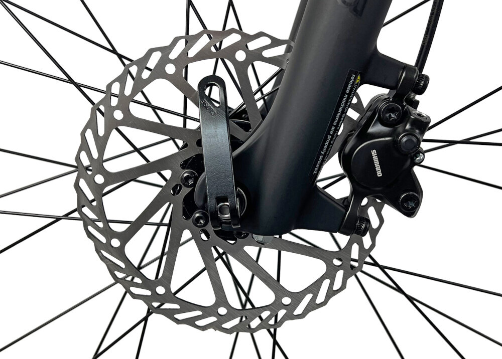 Rower crossowy INDIANA X-Cross 4.0 D17 damski Ciemnoszary zbliżenie na tylny hamulec podstawa bezpieczeństwa hamulce tarczowe hydrauliczne duża siła hamowania w każdych warunkach pogodowych i na każdej trasie płyn hamulcowy hamulce z przodu i z tyłu podwójny pakiet bezpieczeństwa