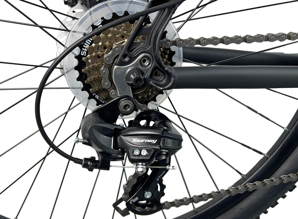 Rower górski MTB INDIANA X-Pulser 2.7 D19 27.5 cala damski Czarno-miętowy zbliżenie na tylną przerzutkę przerzutki marki SHIMANO przednie i tylne przerzutki SHIMANO Tourney duża wytrzymałość sprawne działanie zmiana biegów jest płynna i bezproblemowa 21 biegów