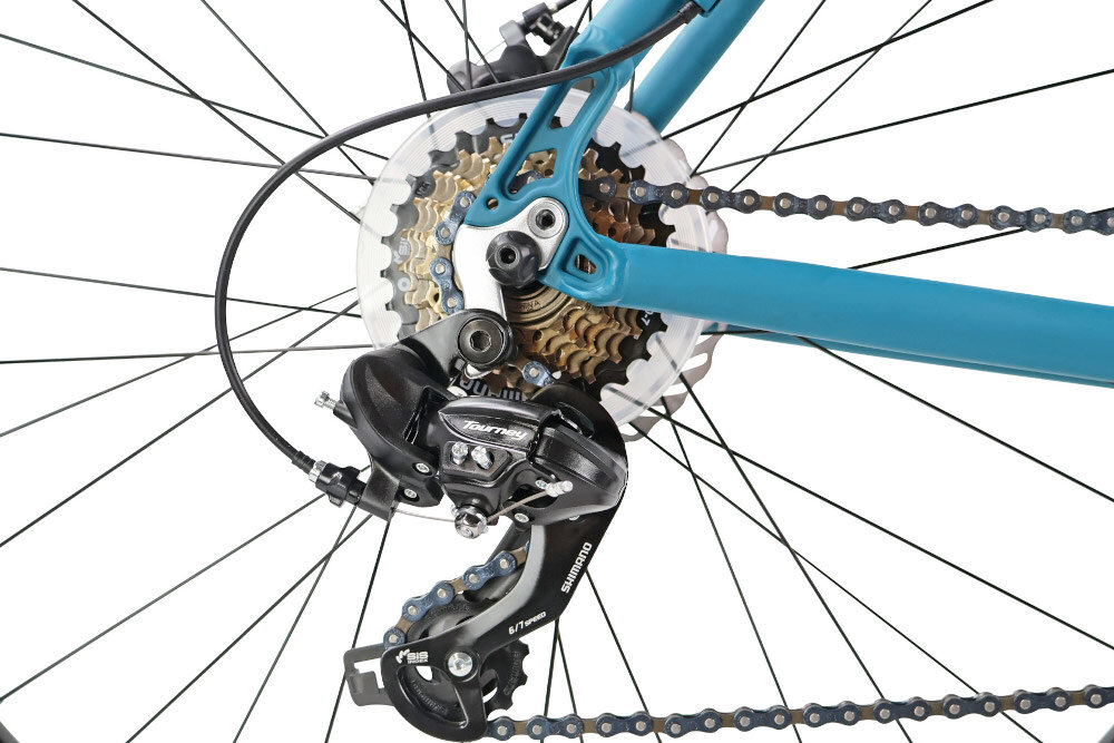 Rower górski MTB INDIANA X-Pulser 1.9 M17 29 cali męski Błękitny zbliżenie na tylną przerzutkę przerzutki marki SHIMANO przednie i tylne przerzutki SHIMANO Tourney duża wytrzymałość sprawne działanie zmiana biegów jest płynna i bezproblemowa 21 biegów