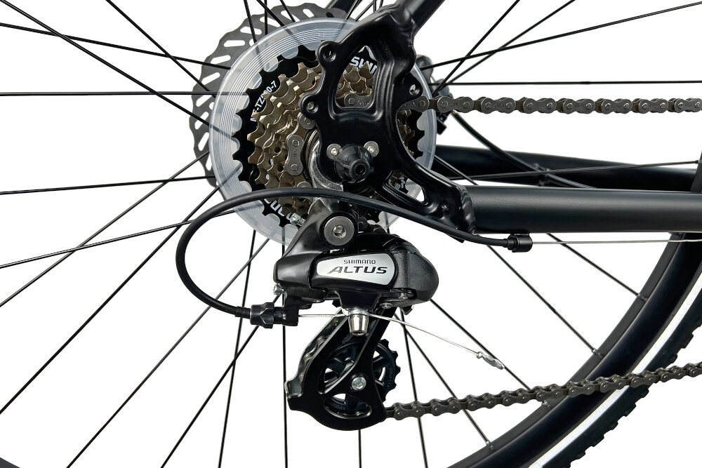 Rower crossowy INDIANA X-Cross 2.0 D21 damski Czarno-różowy zbliżenie na tylną przerzutkę przerzutki marki przerzutki marki SHIMANO 21 biegów duża wytrzymałość sprawne działanie zmiana biegów jest płynna i bezproblemowa przednia przerzutka SHIMANO Tourney tylna siedmiorzędowa przerzutka SHIMANO Altus technologia Shadow przerzutka jest schowana i mniej narażona na uszkodzenia