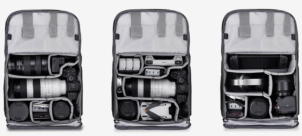 Trzy otwarte plecaki z przegrodami, w środku aparaty, obiektywy, dron, baterie oraz konsola przenośna