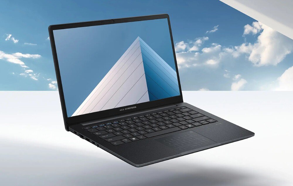 Laptop ASUS ExpertBook B1403CVA-S60475X Laptop z otwartym ekranem, unoszący się w powietrzu na tle błękitnego nieba z chmurami. Wyświetlacz pokazuje grafikę przedstawiającą budynek z geometrycznymi kształtami, opis