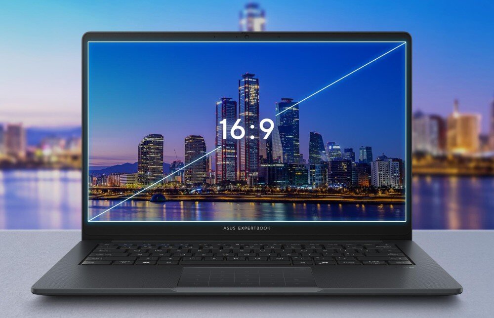 Laptop ASUS ExpertBook B1403CVA-S60475X Laptop na tle nocnego miasta z otwartym ekranem, na którym widoczny jest panoramiczny widok drapaczy chmur i oznaczenie proporcji 16:9, wyświetlacz, rozdzielczość, matryca