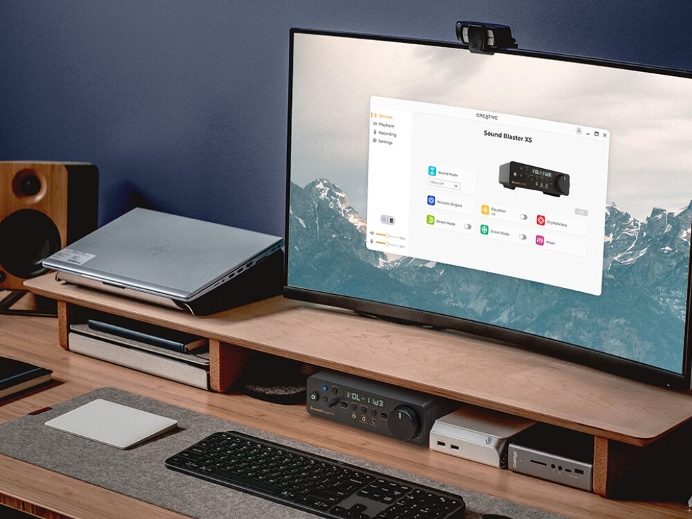 Karta dźwiękowa CREATIVE Sound Blaster X5
                karta dźwiękowa na biurku liczne złącza analogowe optyczne port usb-c tryby pracy regulacja poziomu wzmocnienia wyjście na słuchawki głośniki