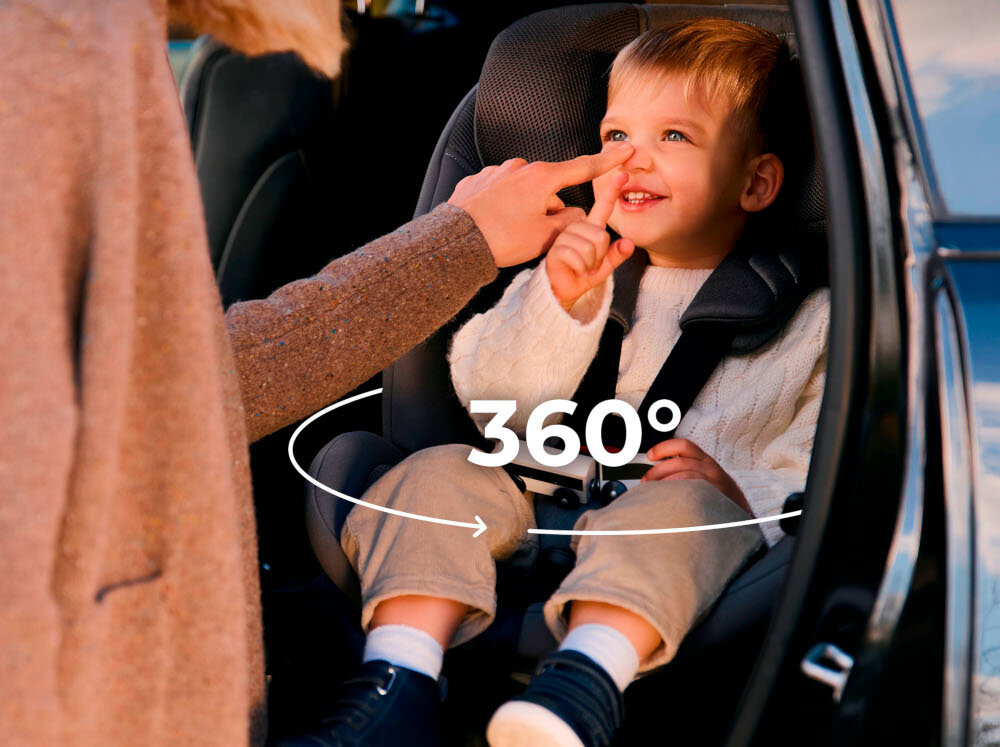 Fotelik samochodowy KINDERKRAFT Xrider 2 I-size 40-150 cm (0-21 kg) Szary wnętrze samochodu dziecko siedzi w foteliku strzałka pokazująca możliwość obrotu system EASY SPIN SYSTEM 360° zmiana kierunku montażu wygodne wkładanie i wyjmowanie malucha z fotelika jeden prosty ruch pozwala obrócić fotelik