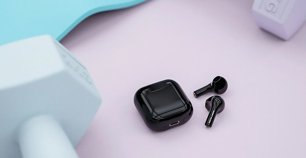 Słuchawki douszne HAPPY PLUGS Joy - Wygoda i swoboda bez kabli, słuchawki z euti ładującym leżące na podłodze