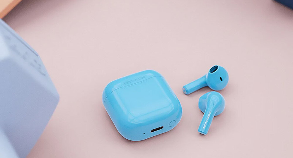 Słuchawki douszne HAPPY PLUGS Joy - Głośno i czysto, słuchawki z etui ładującym leżącym na podłodze