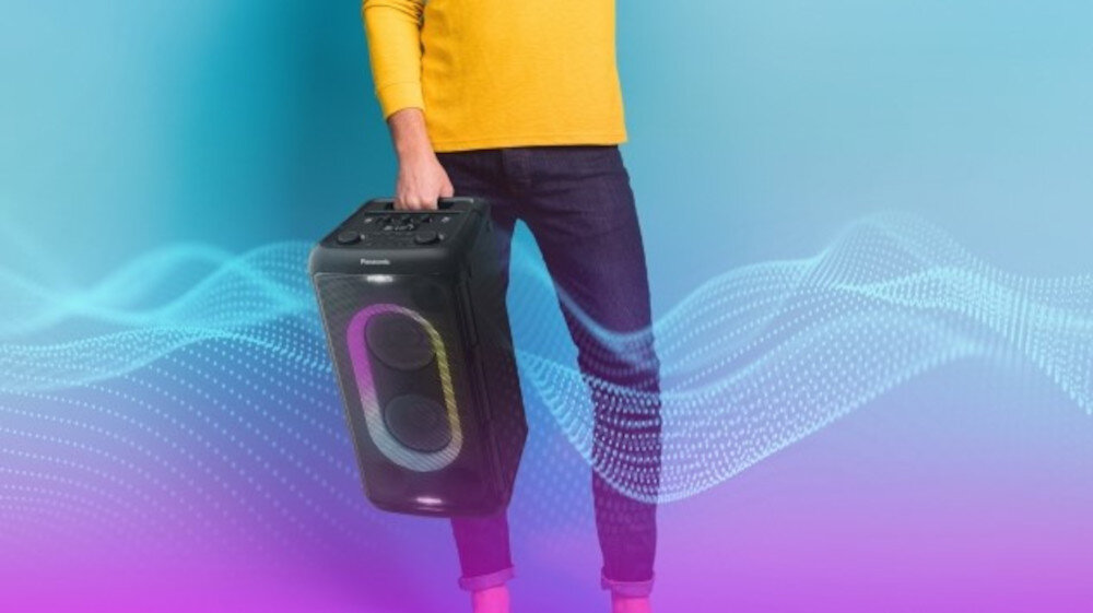 Power Audio PANASONIC SC-BMAX10E-K uchwyt przenoszenie mobilność bezprzewodowy, osoba trzymająca głośnik za uchwyt
