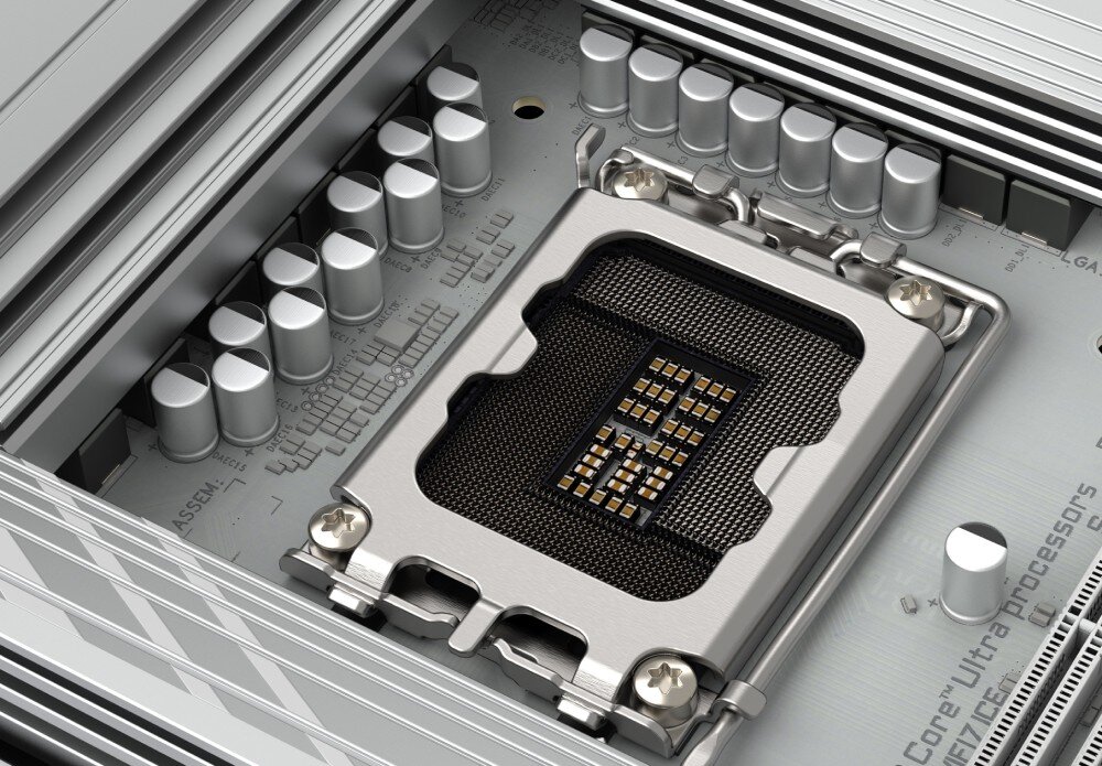 Płyta główna GIGABYTE Z890M Aorus Elite WiFi7 Ice Zbliżenie na puste gniazdo procesora z widocznymi pinami otoczone przez srebrne radiatory i srebrne kondensatory