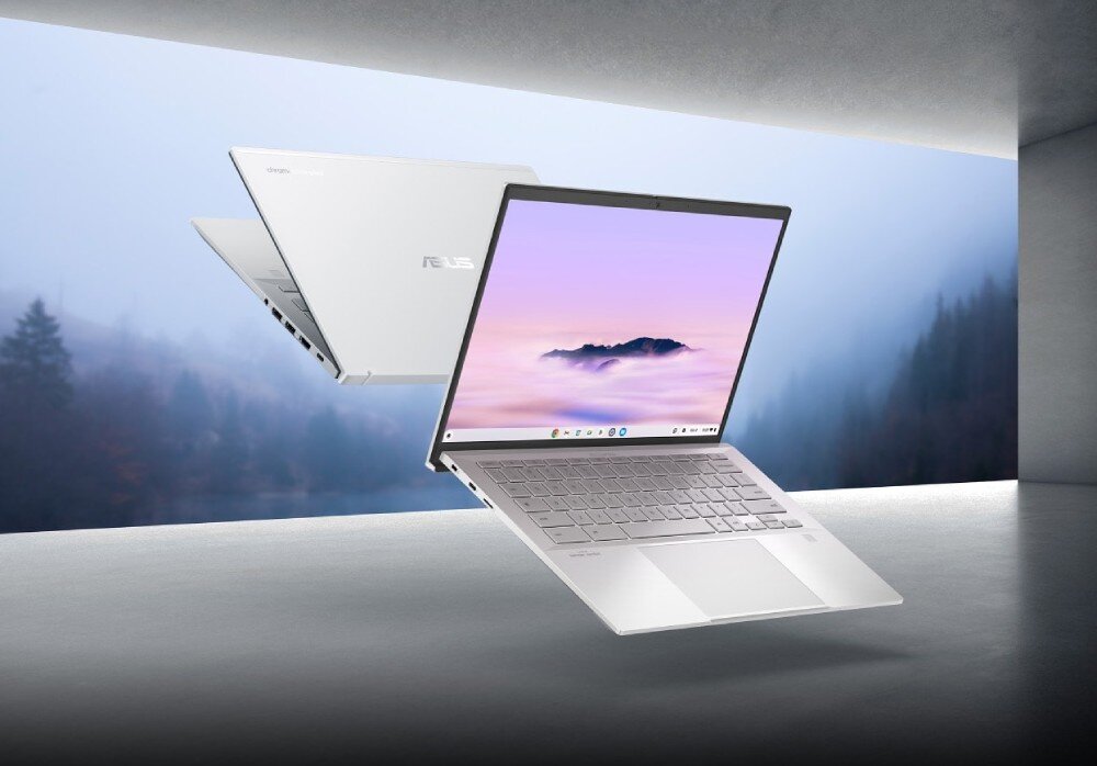 Laptop ASUS ExpertBook CX5403CMA-QM0137 Dwa srebrne laptopy unoszące się w przestrzeni z widokiem na góry za oknem; jeden otwarty pokazuje ekran z pastelową tapetą, drugi zamknięty ukazuje logo producenta, opis