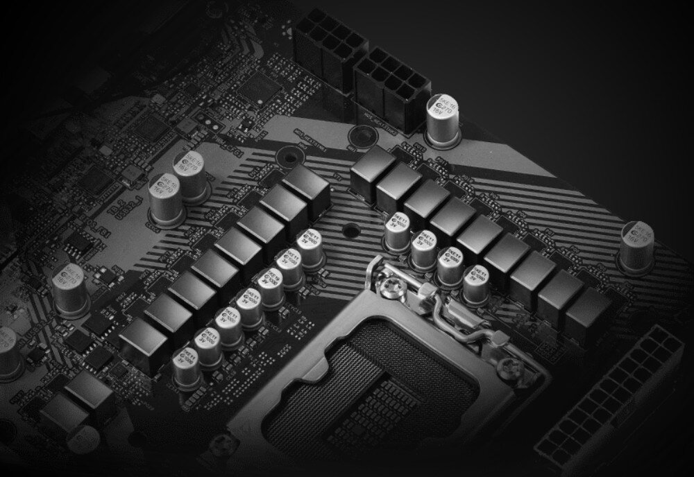 Płyta główna ASROCK Z890 Pro RS Czarno-białe zbliżenie na komponenty sekcji zasilania umieszczone wokół gniazda procesora