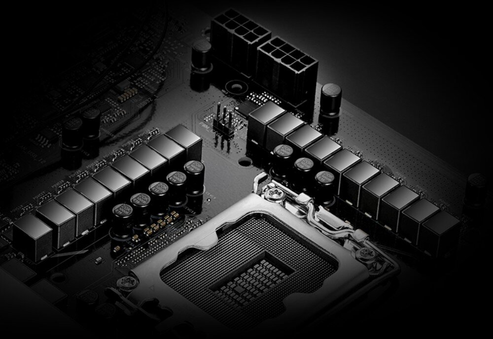 Płyta główna ASROCK Z890 Riptide WiFi Sekcja zasilania płyty głównej z widocznymi tranzystorami i kondensatorami wokół gniazda procesora, układ zasilania, komponenty, stabilność