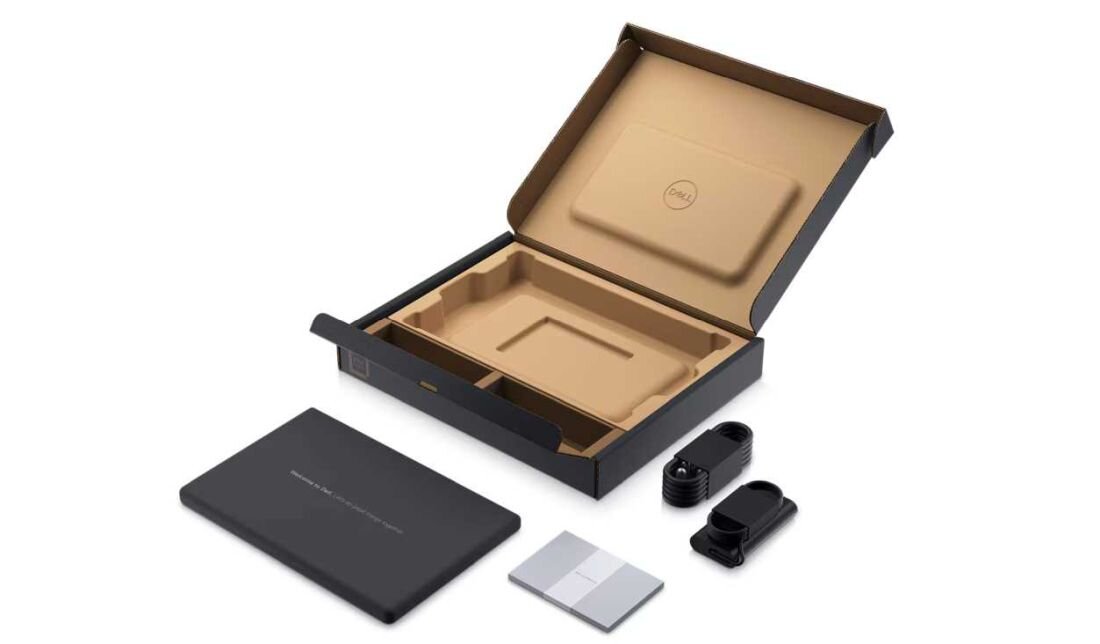 Opakowanie DELL Latitude 5450 zawiera laptop, zasilacz i kable. - materiały przyjazne dla środowiska