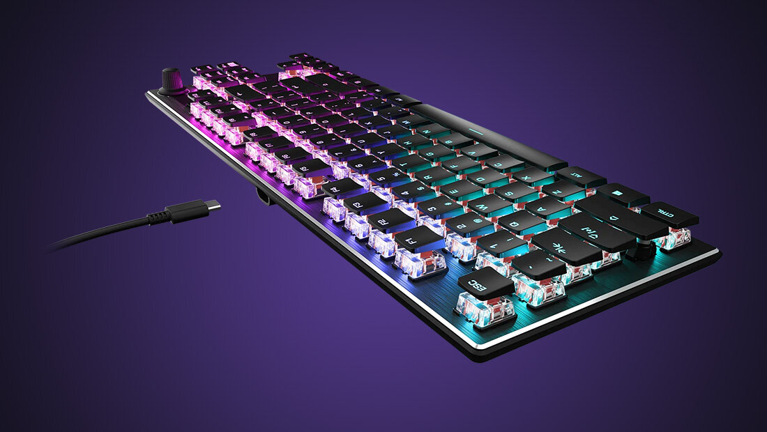 TURTLE BEACH Vulcan TKL Aimo, z myślą o wygodzie, układ TKL, ergonomiczny kształt, brak klawiatury numerycznej,
fioletowe tło, produkt, kabel zakończony wtyczką USB-C