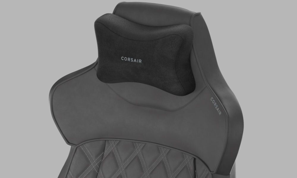 Fotel CORSAIR TC500 Luxe Grafitowy fotel wyposażony w odłączaną poduszkę pod szyję wykonaną z pianki memory łatwa regulacja wysokości poduszki szare tło