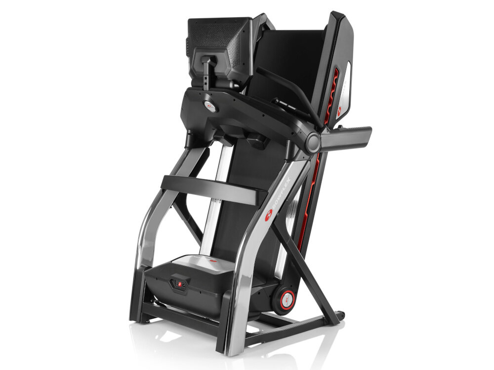 Bieżnia elektryczna BOWFLEX T56 2941W 20km-h złożona bieżnia na białym tle funkcja składania wymiary po złożeniu 100,5 x 177,7 x 113 cm rolki transportowe