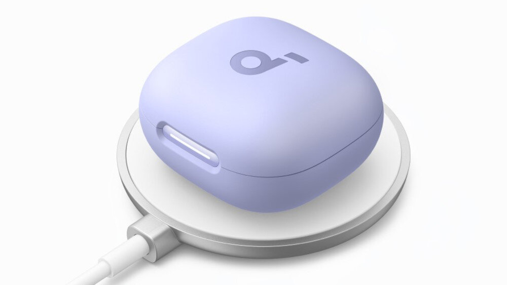 Słuchawki dokanałowe SOUNDCORE P40i ANC ładowanie bezprzewodowe indukcyjne etui, etui ładukące położone na ładowarce indukcyjnej