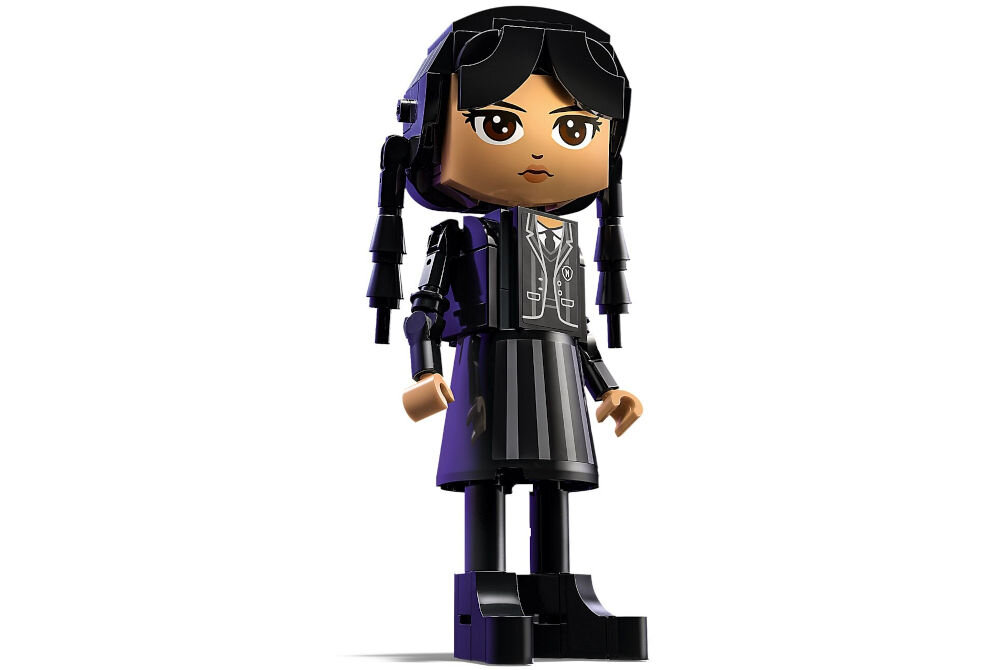 LEGO 76780 Wednesday Figurka Wednesday Addams pomysł na prezent dla miłośników Wednesday bogata zawartość zestawu mroczny klimat na zdjęciu 
					złożona figurka na białym tle