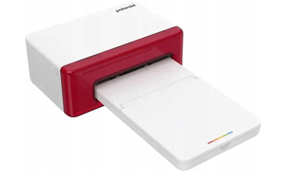Drukarka POLAROID Hi-print 4x6 E-Box Druk w kolorze, Bluetooth prezentacja drukarki od przodu pod kątem na białym tle bezprzewodowe połączenie ze smartfonem Android i iOS