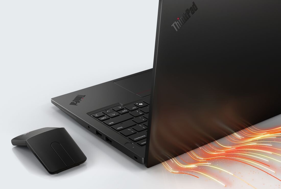 Laptop Lenovo ThinkPad z czarną myszką bezprzewodową na białym tle z kolorowymi efektami świetlnymi. - System chłodzenia Efektywne odprowadzanie ciepła