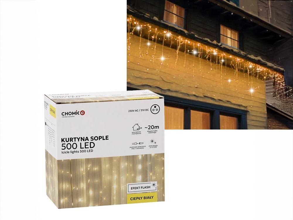 Kurtyna dekoracyjna EXTRALINK 9881 500 LED Sieciowe 20 m Biały, sople, flash, lód, atmosfera, na białym tle opakowanie fabryczne kurtyny wraz z kurtyna rozwieszona na ścianie budynku świeci ciepłym kolorem