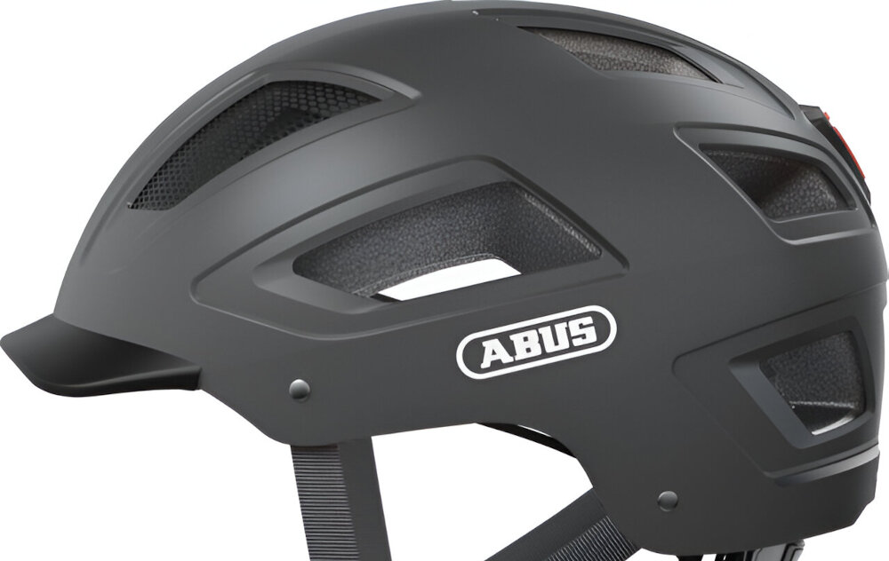 Kask rowerowy ABUS Hyban 2.0 Tytanowy Miejski rozmiar L zbliżenie na skorupę kasku widoczność z boku twarda skorupa z tworzywa ABS chroni głowę przed uderzeniami i uszkodzeniami mechanicznymi wewnętrzna warstwa z pianki EPS pochłania siłę wstrząsów spójna całość trwałość i skuteczność ochrony bezpieczny trwały