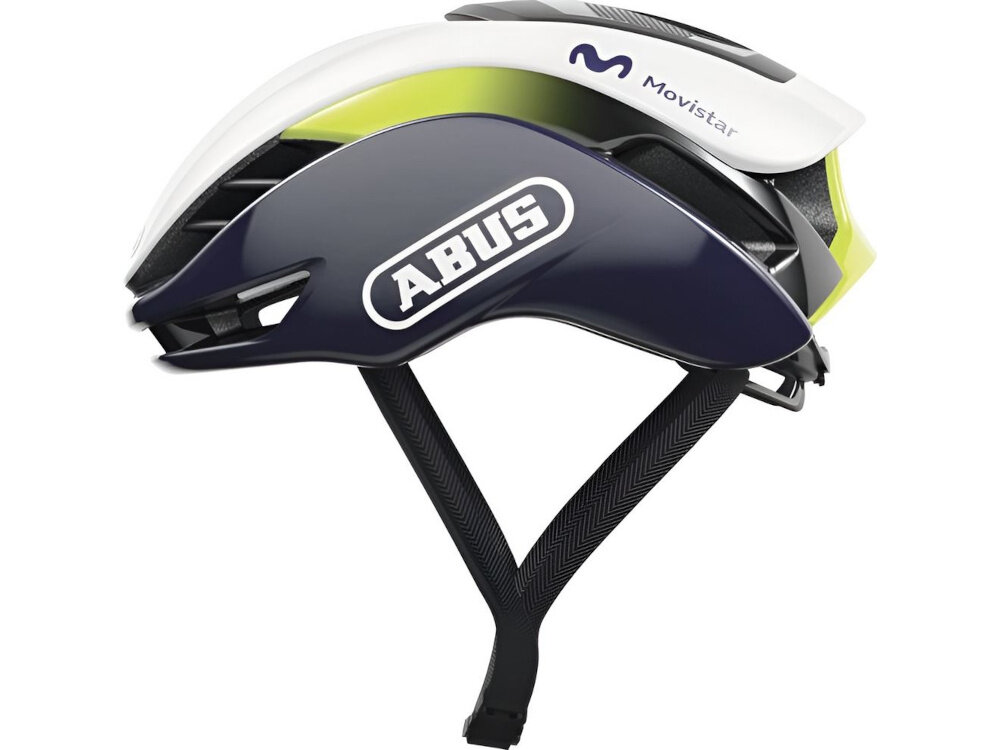 Kask rowerowy w kolorach czarno-białym z elementami zielonymi, z widocznym logo \'ABUS\' oraz napisem \'Movistar\'.