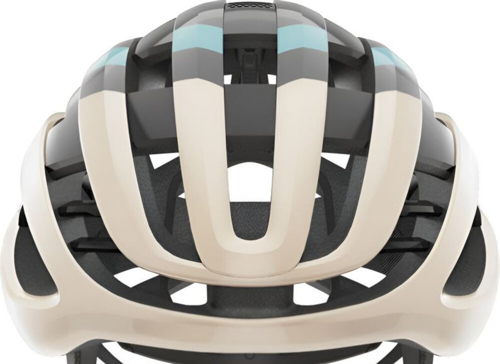 Kask rowerowy ABUS AirBreaker Szampańskie złoto Szosowy rozmiar S zbliżenie na skorupę kasku białe tło zintegrowane w strukturze EPS wzmocnienie ActiCage Lite usztywnia konstrukcję w strategicznych miejscach bez ograniczania wentylacji wysoka odporność na odkształcenia w razie upadku wysoki poziom ochrony przy zachowaniu lekkości i komfortu