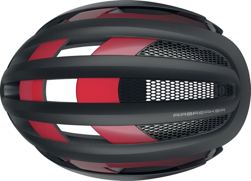 Kask rowerowy ABUS AirBreaker Czarno-czerwony Szosowy rozmiar M kask widoczny od góry białe tło zaawansowany system Forced Air Cooling 11 wlotów 13 wylotów powietrza regulują temperaturę pod skorupą kasku kanały wentylacyjne powietrze krąży równomiernie