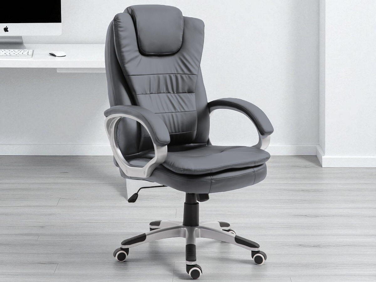 Fotel ACTIVEJET YK7304 Szary Podgrzewany z masażem, dopasowanie, gabinet, biuro, praca, wnętrza, fotel na środku pokoju frontem lewo skos w tle biurko