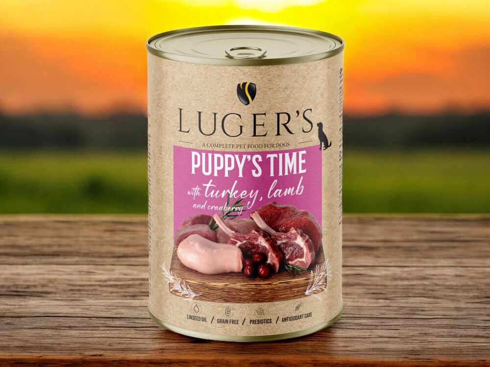 Karma dla psa LUGER'S Puppy's Time z indykiem, jagnięciną i żurawiną 400 g karma w puszce na blacie