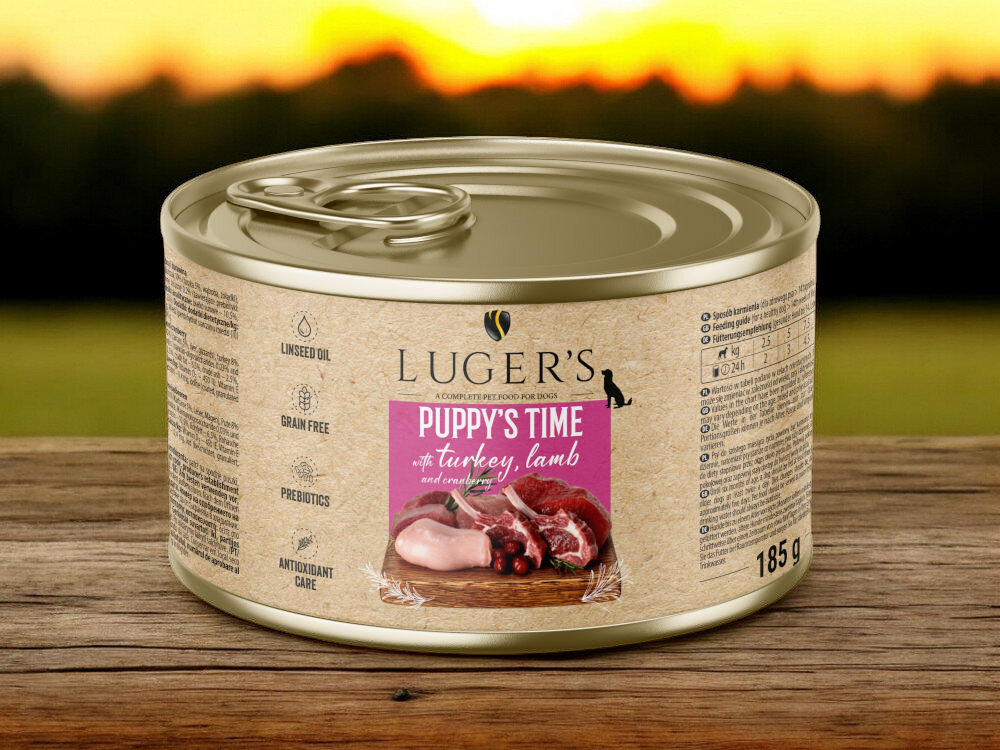Karma dla psa LUGER'S Puppy's Time z indykiem, jagnięciną i żurawiną 185 g karma w puszce na blacie