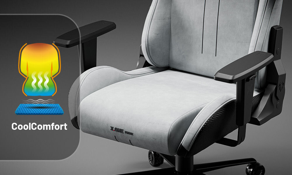 Fotel DIABLO CHAIRS X-One 2.0 Prime Szary prezentacja fotela od przodu na szarym tle zbliżenie na dolną część fotela warstwa chłodząca CoolComfort™ wspomaga cyrkulację powietrza zapobiega przegrzewaniu