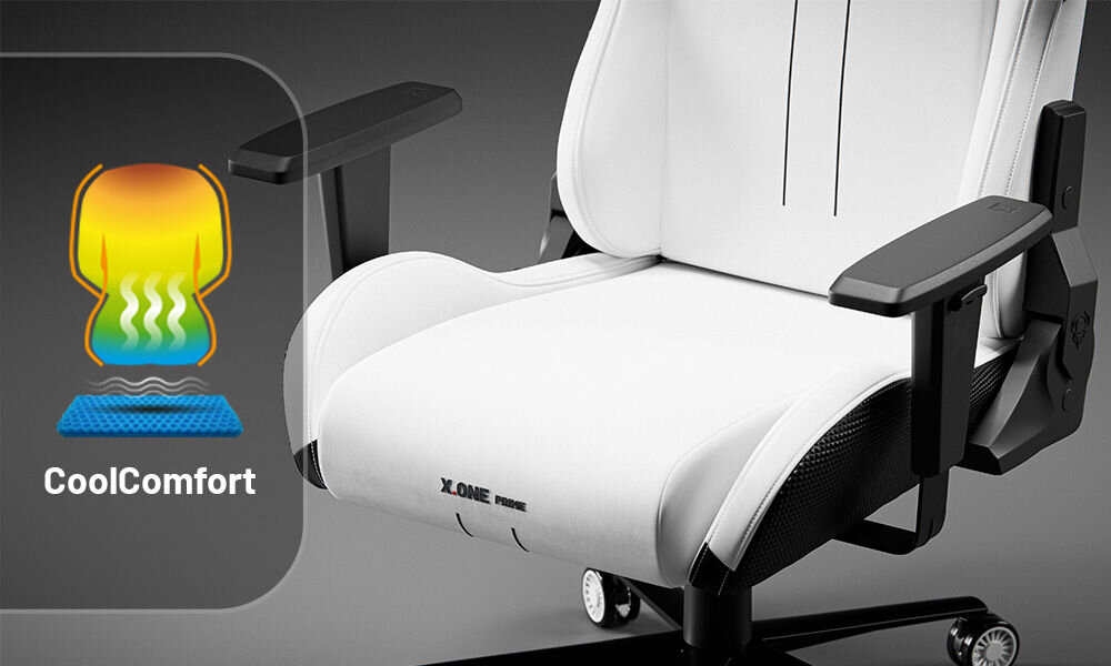Fotel DIABLO CHAIRS X-One 2.0 Prime Biało-czarny prezentacja fotela od przodu na szarym tle zbliżenie na dolną część fotela warstwa chłodząca CoolComfort™ wspomaga cyrkulację powietrza zapobiega przegrzewaniu