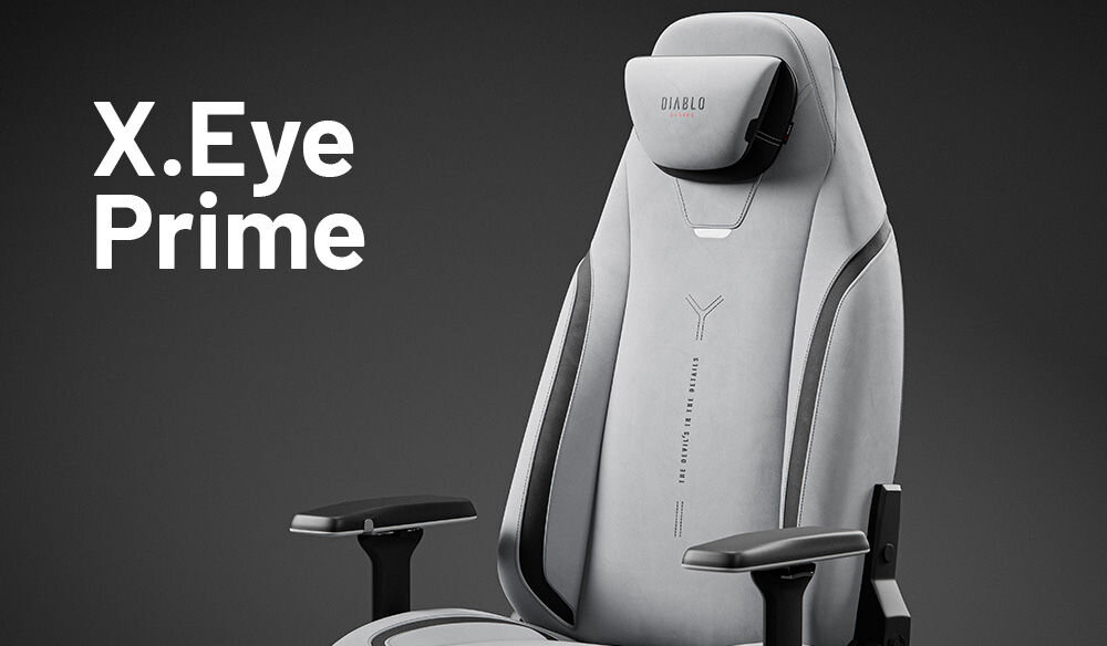 Fotel DIABLO CHAIRS X-Eye 2.0 Szary prezentacja fotela na szarym tle z dopisem modelu podnosi komfort technologie premium wygoda funkcjonalność Xtreme Prime