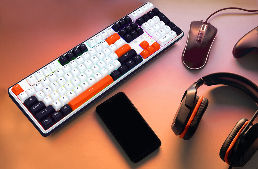 Klawiatura K689WBO-RGB-PRO Wyvern
zyskaj przewagę w grze, pomarańczowe tło, produkt, telefon, słuchawki, mysz