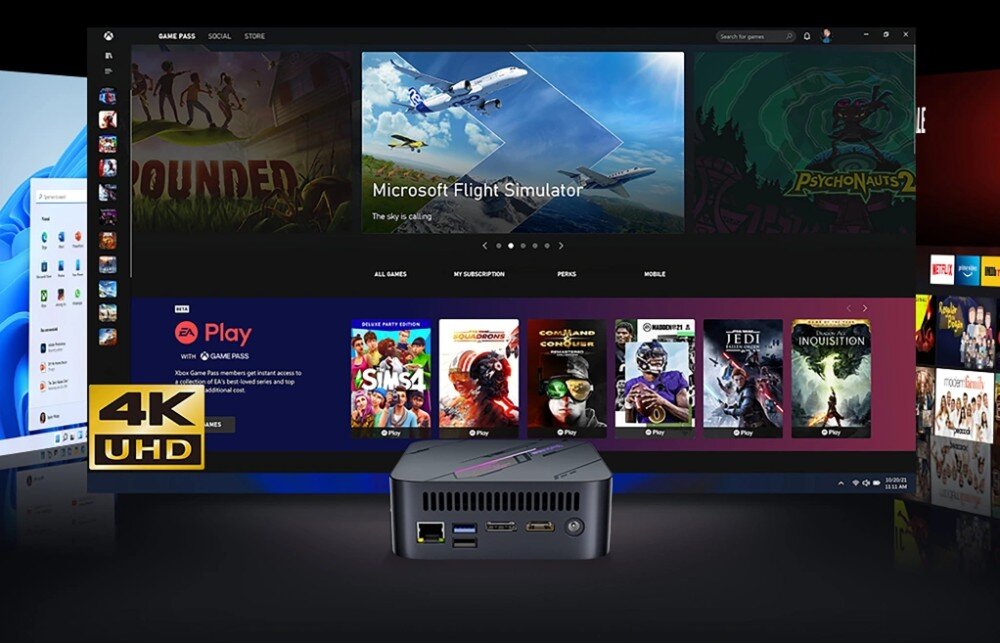 Komputer BLACKVIEW MP100 Komputer mini ustawiony przed monitorem, na ekranie widoczne menu z grami w jakości 4K UHD, ekrany