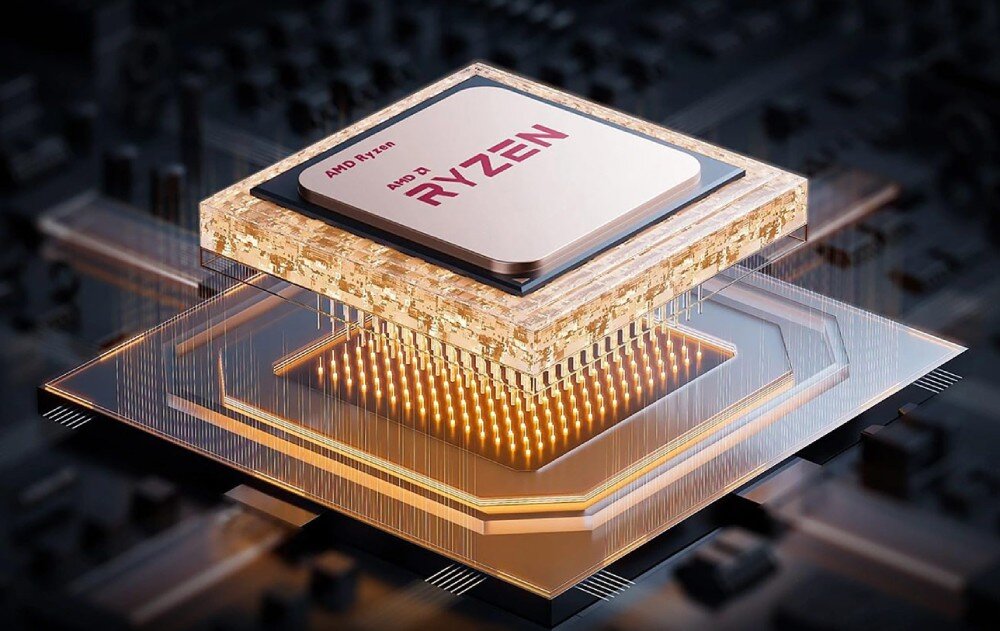 Komputer BLACKVIEW MP100 Zbliżenie na procesor z napisem 'AMD Ryzen', uniesiony nad płytą główną z widocznymi złotymi pinami i podświetleniem, podzespoły, procesor, wydajność