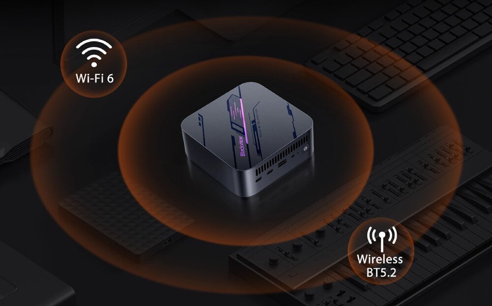 Komputer BLACKVIEW MP100 Komputer mini na biurku otoczony pomarańczowymi kręgami symbolizującymi łączność Wi-Fi 6 i Bluetooth 5.2, łączność Wi-Fi 6, Bluetooth 5.2, sieć