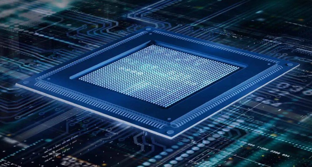 Chip umieszczony na górze płytki obwodowej, z widocznymi połączeniami elektrycznymi. procesor rdzenie taktowanie moc obliczeniowa