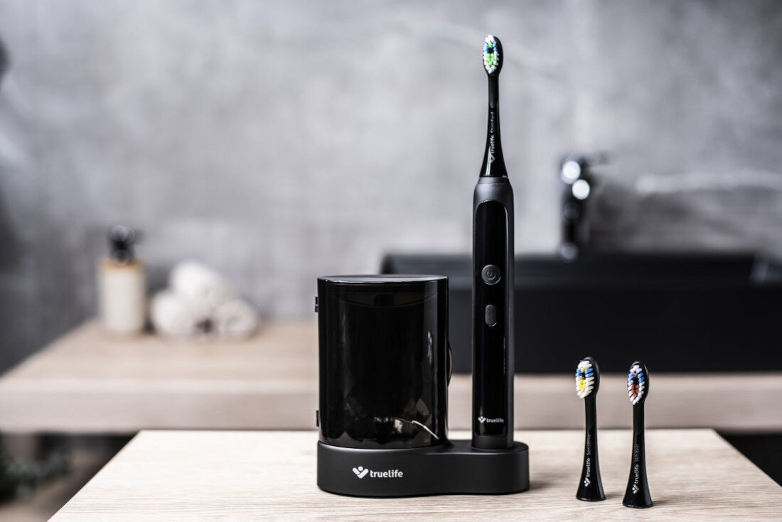 Szczoteczka soniczna TRUELIFE SonicBrus K150 UV Czarny Pielęgnacja jamy ustnej wygląd design tło prezentacja wizualizacja