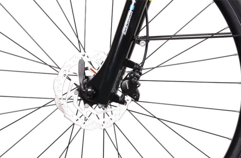 Rower elektryczny BOTTECCHIA Holliwood D17 28 cali Srebrny zbliżenie na tarczę hamulcową podstawa bezpieczeństwa hamulce tarczowe hydrauliczne duża siła hamowania płyn hamulcowy hamulce z przodu i z tłu podwójny pakiet bezpieczeństwa