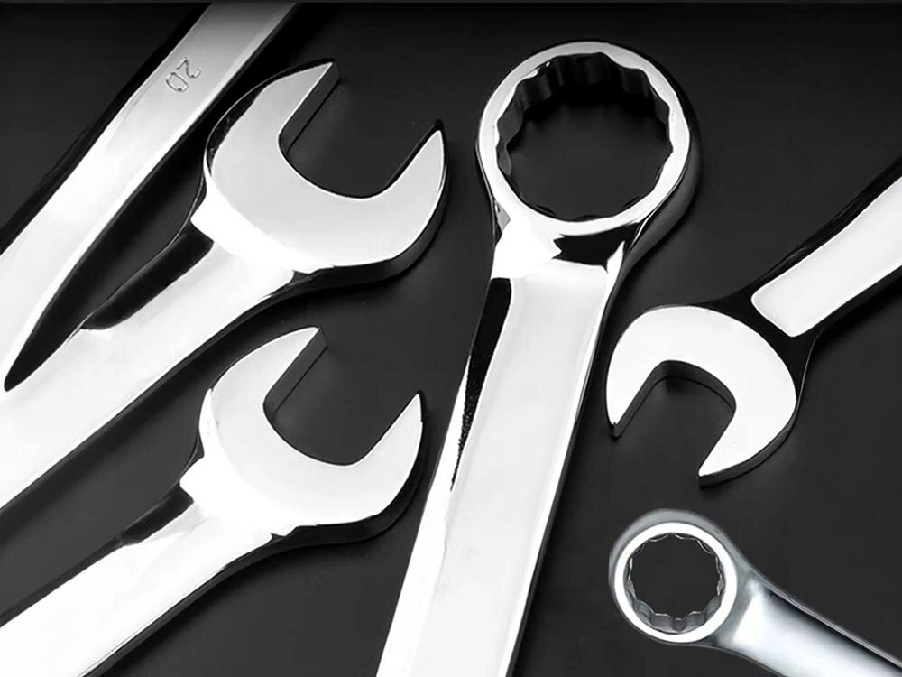 Zestaw kluczy płasko-oczkowych EXTRALINK 1291 (8 elementów), rozmiary, klucze, śruby, naprawy, na czarnym tle zbliżenie na grupę kluczy płasko oczkowych