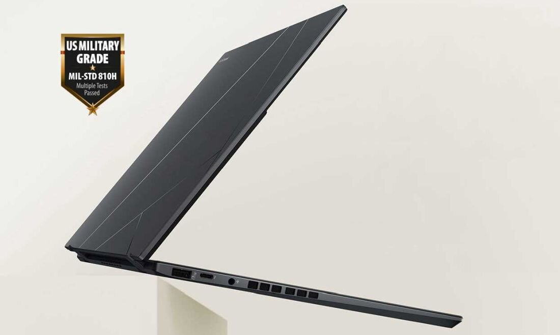 Otwarty laptop ASUS Zenbook DUO z czarnym korpusem. - Wytrzymałość klasy wojskowej MIL-STD 810H