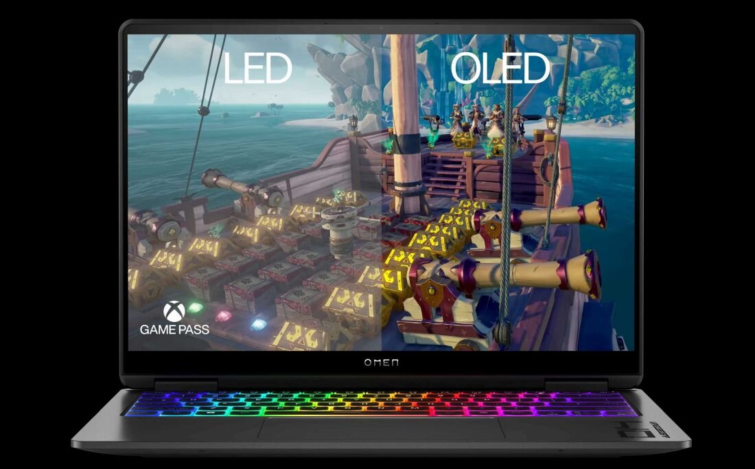Laptop z włączoną grą na ekranie, pokazujący dynamiczną akcję i kolorową grafikę. - 14-calowy ekran 3K (2880 x 1800 px) OLED