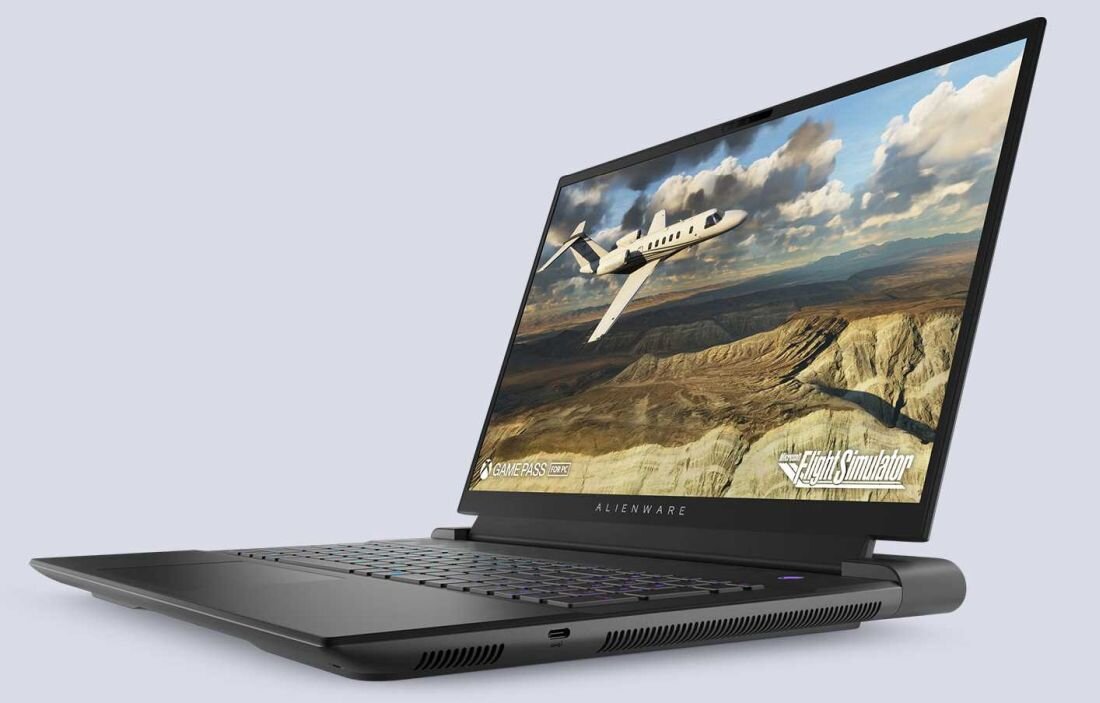 Laptop DELL Alienware M18 R2 18R2 - Laptop DELL Alienware M18 z widokiem samolotu na ekranie, symbolizujący technologię i podróże.  