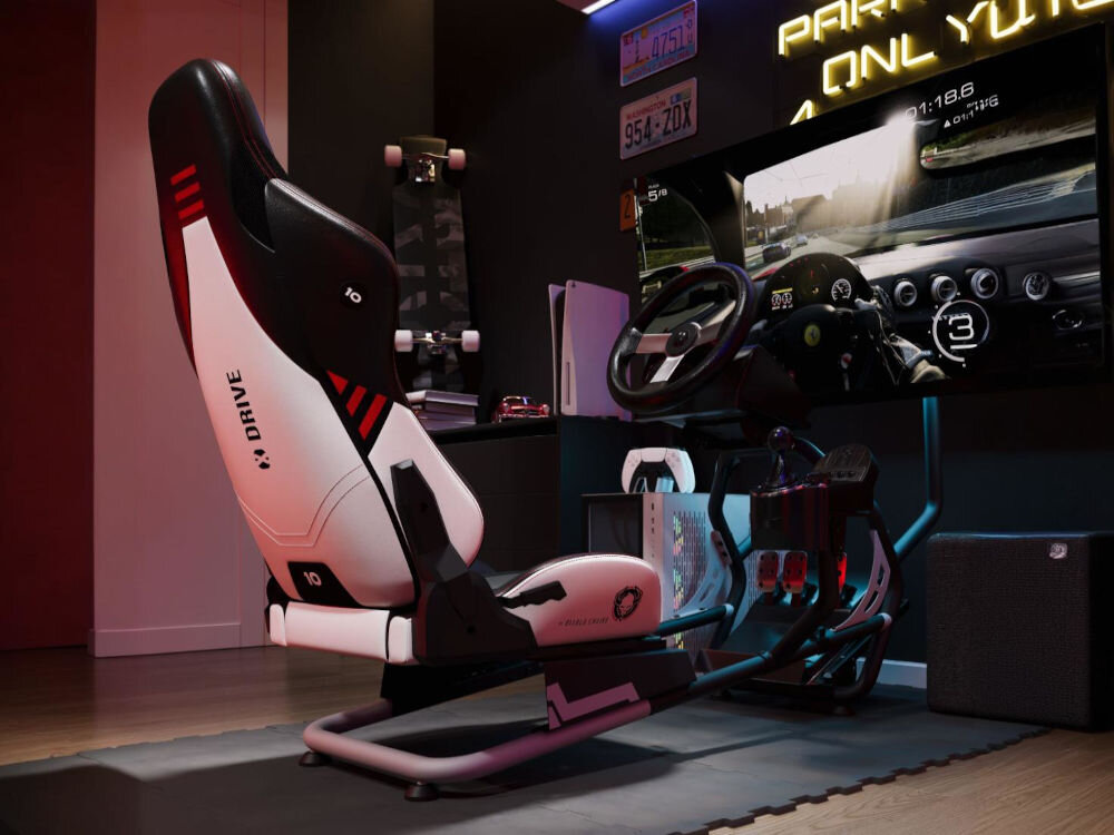 Kokpit DIABLO X-Drive Czarno-Biały wizualizacja kokpitu w pokoju wśród akcesoriów gamingowych efektowny design wyścigowe stanowisko kompatybilne z większością simracingowych akcesoriów obszerna konfiguracja komfort sportowa adrenalina wytrzymałość