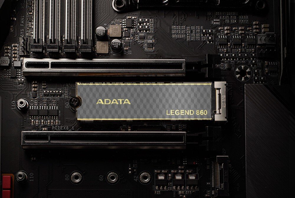 Dysk ADATA Legend 860 2TB SSD Dysk w formacie M.2 zamontowany na płycie głównej komputera, ujęcie z góry z widocznymi slotami PCIe, technologie, korekcja błędów